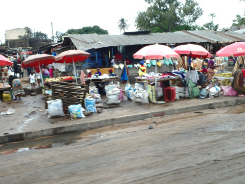 A heavy rain has wet down all of the street markets.